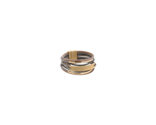 Gold and leather bracelet on a white background