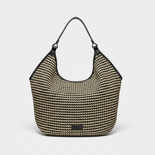 Woven handbag with a black handle on a light gray background